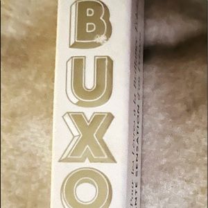 Buxom lipgloss. Lavender Cosmo. Brand new in box.